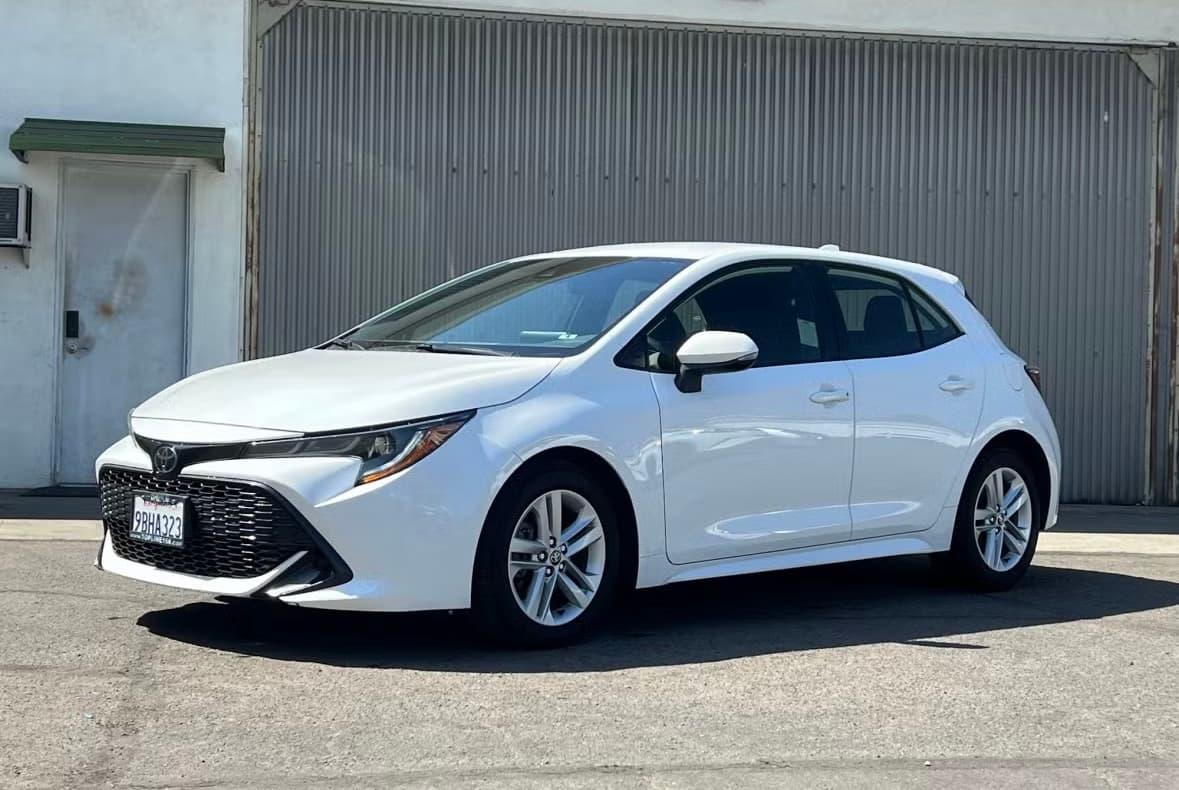 White Toyota Corolla Hatchback rental car