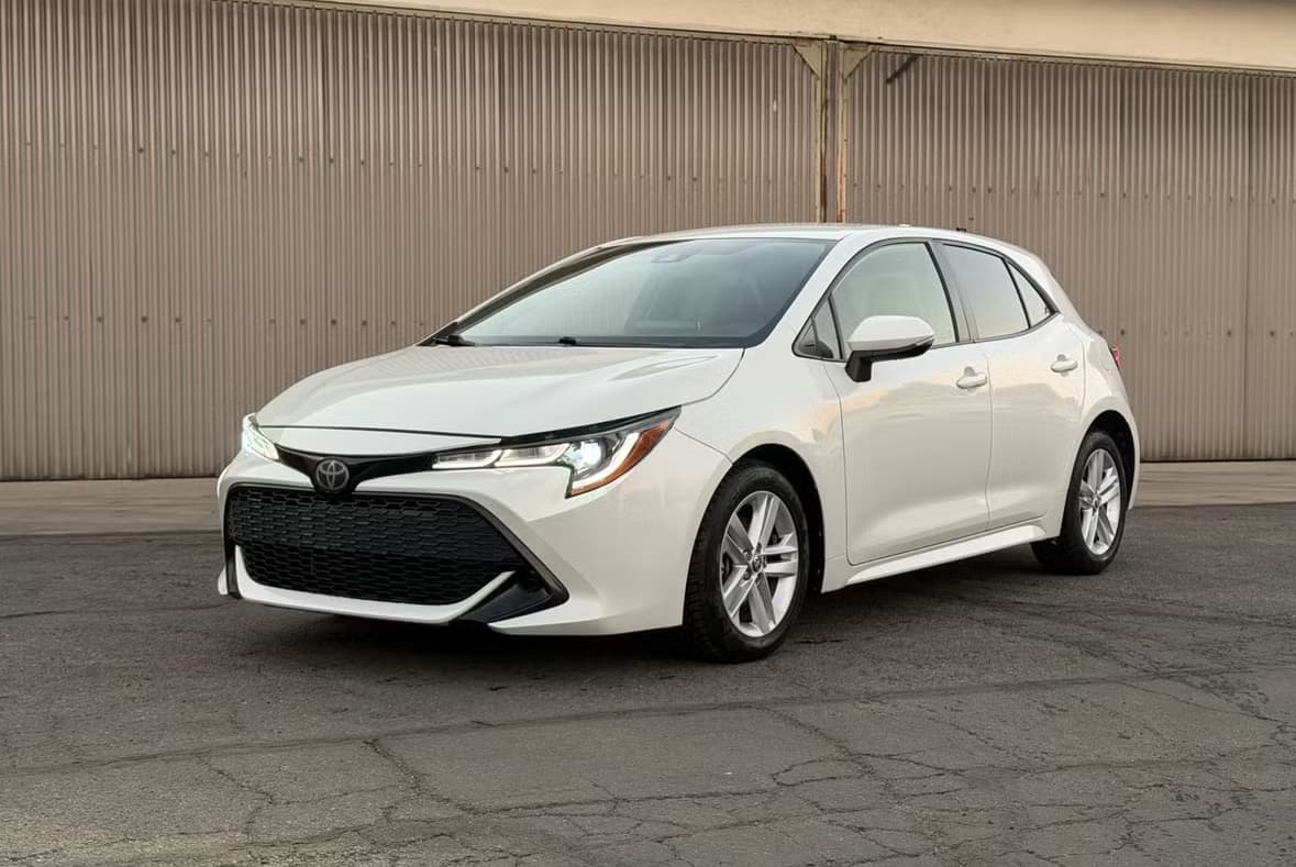 White Toyota Corolla Hatchback rental car
